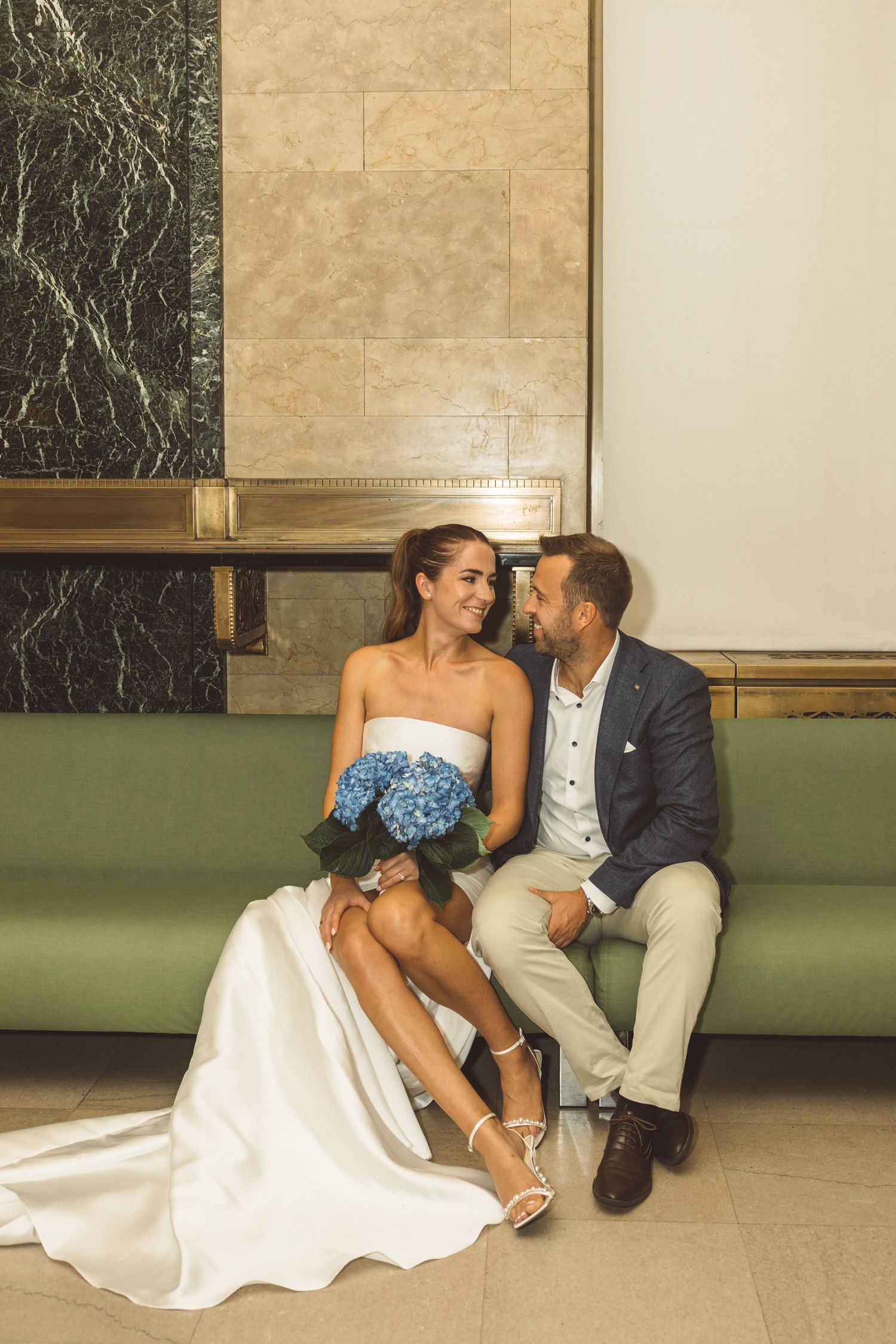 cute picture of the newlyweds smiling at each other after their NYC elopement ceremony