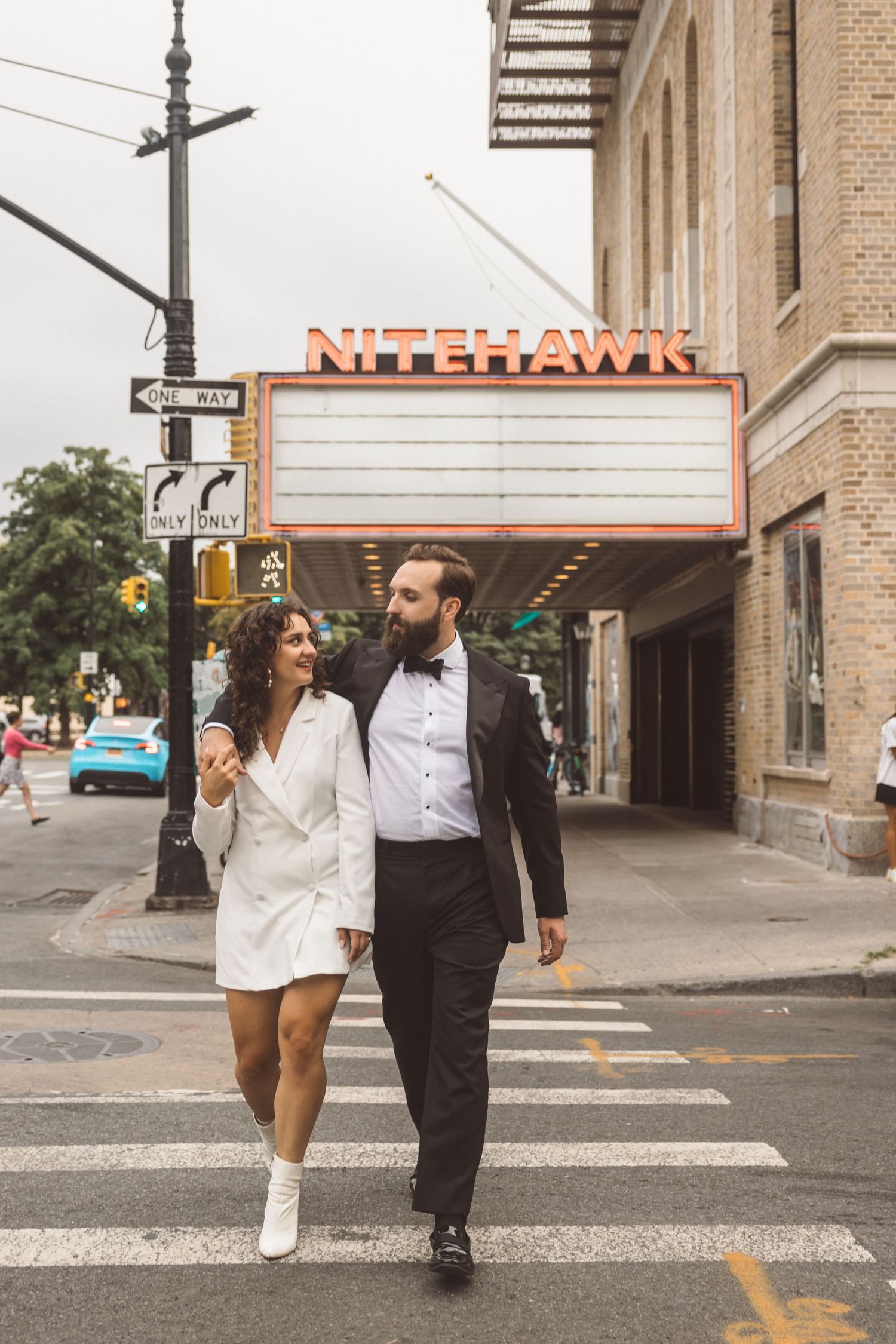couple walking around brooklyn during their photoshoot