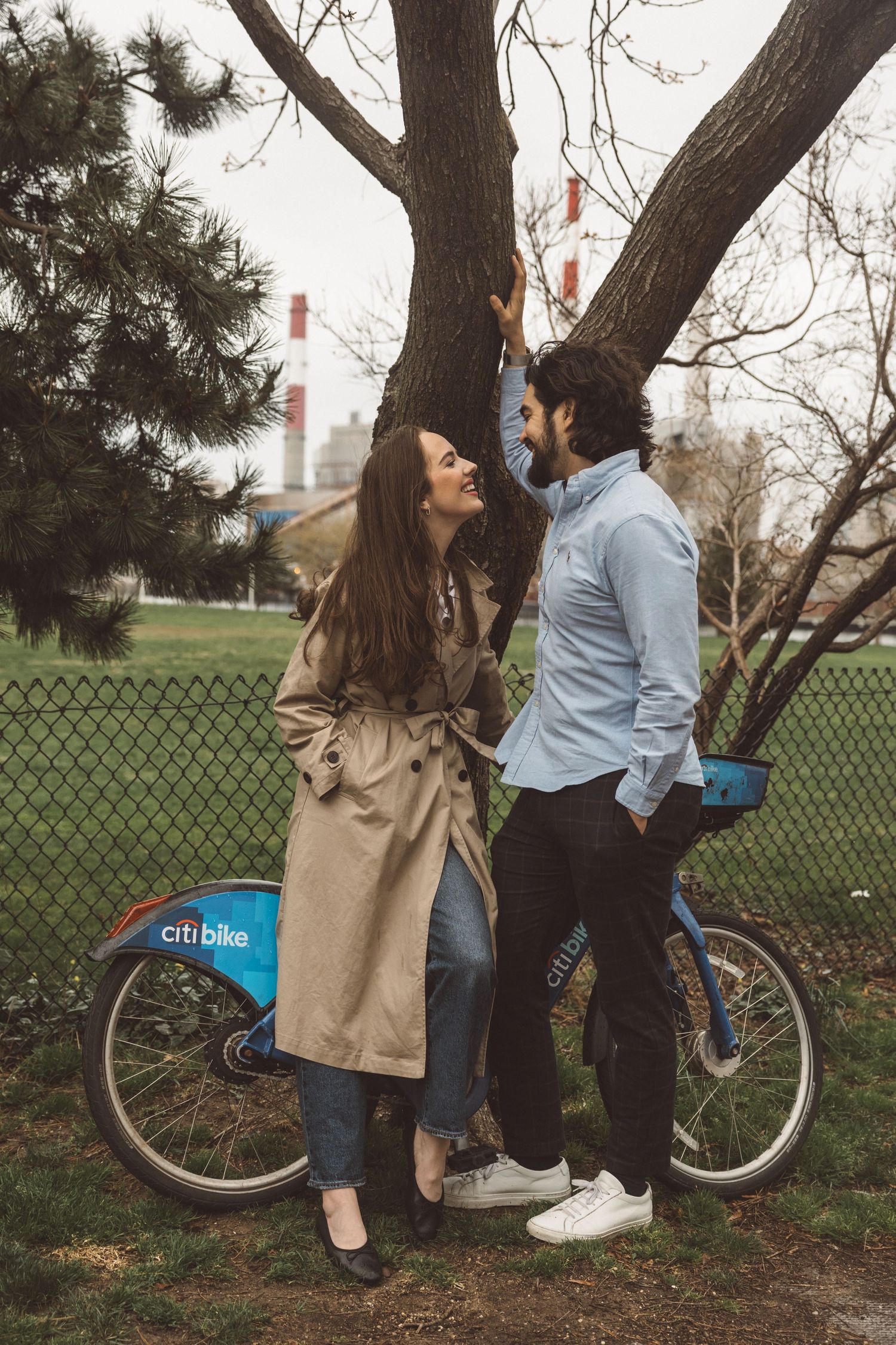 Editorial-style image of couple sharing a quiet moment by Citi Bike in NYC