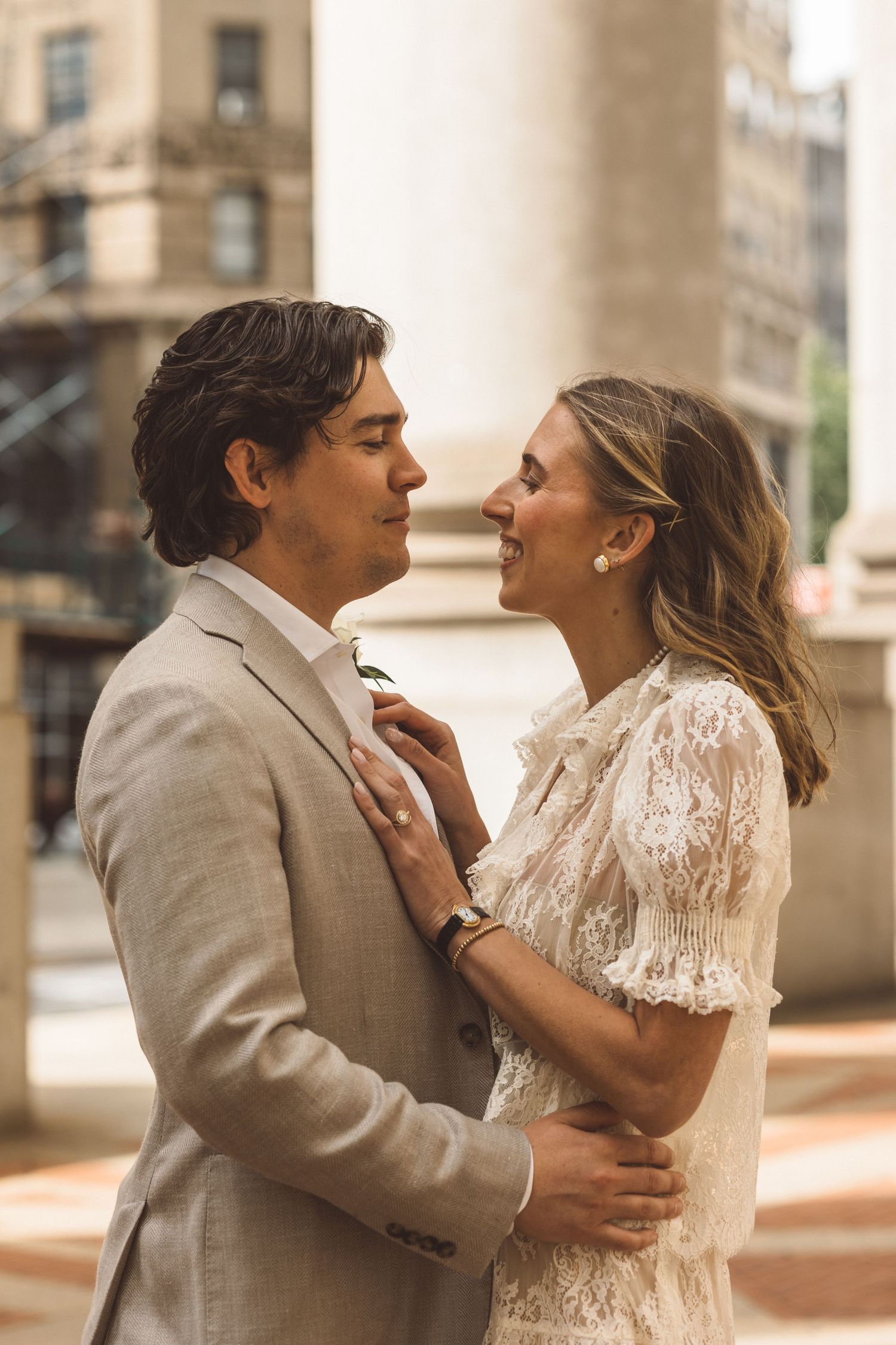 Picture of the bride and groom, laughing with each other
