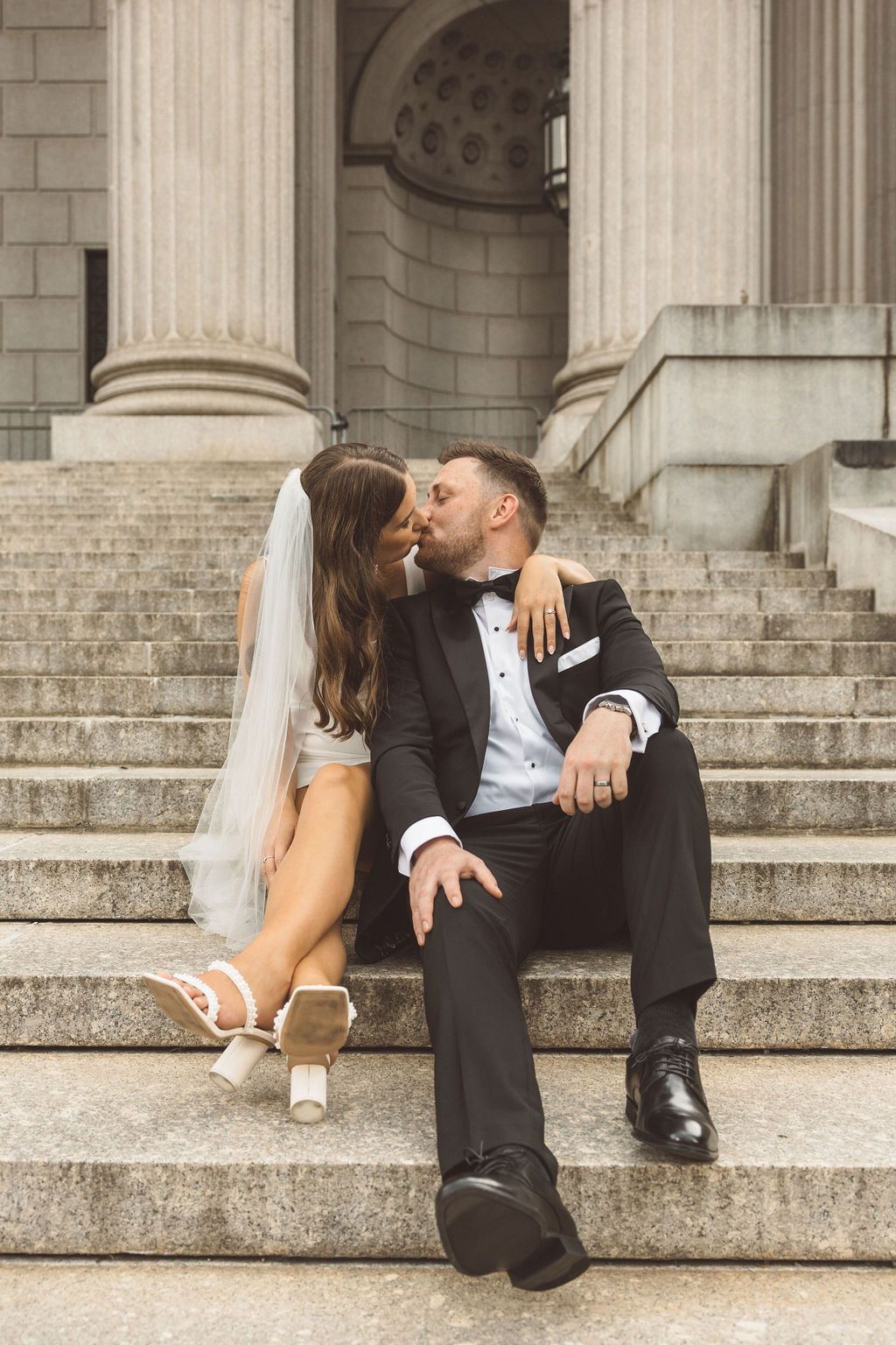 cute picture of the newlyweds smiling at each other