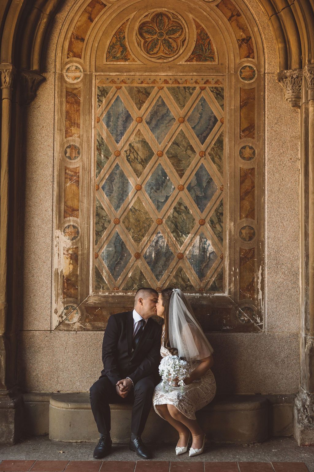 cute picture of the newly married couple kissing