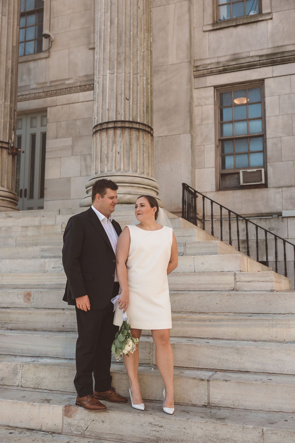 picture of the newlyweds holding hands