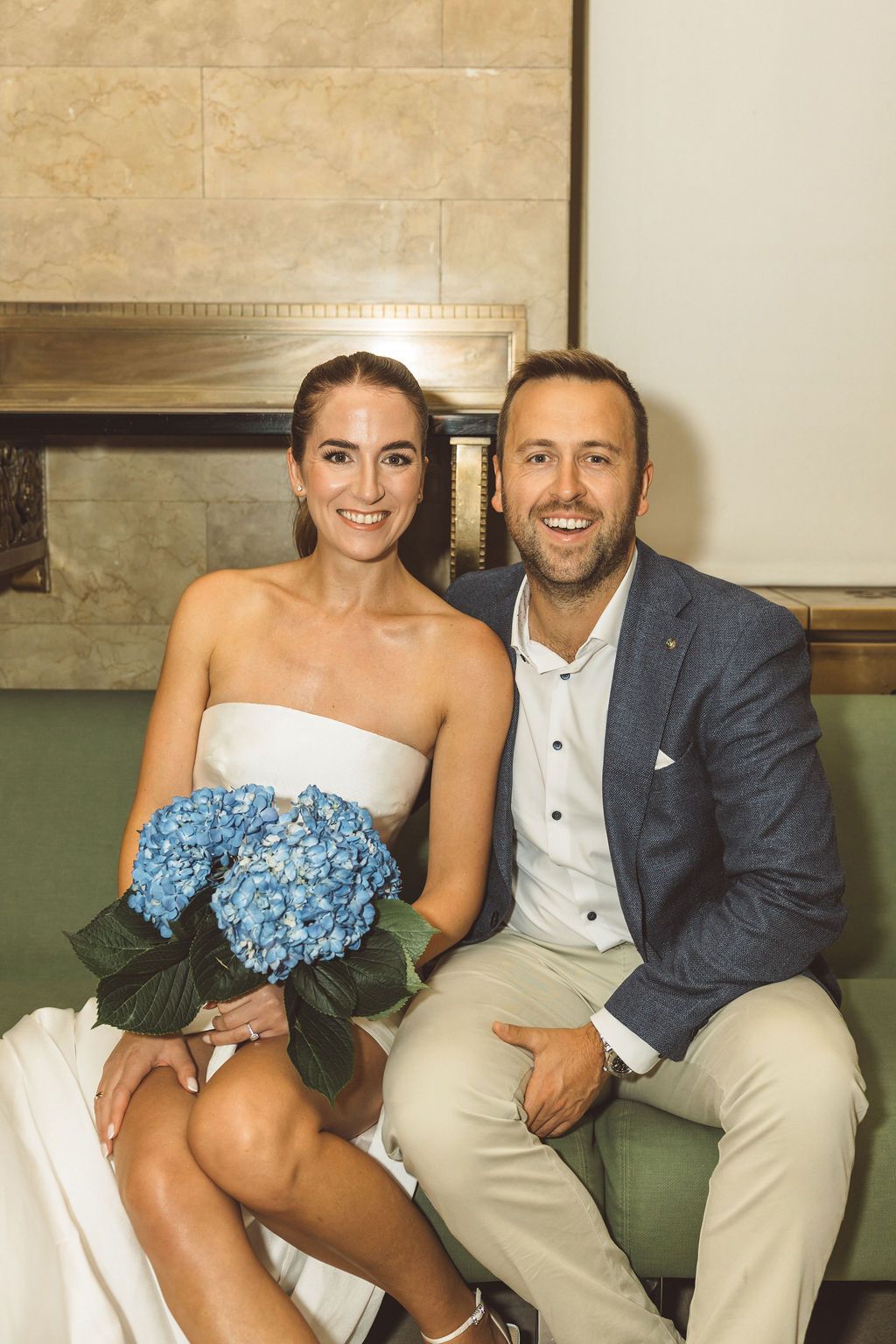 cute picture of the bride and groom smiling at the camera