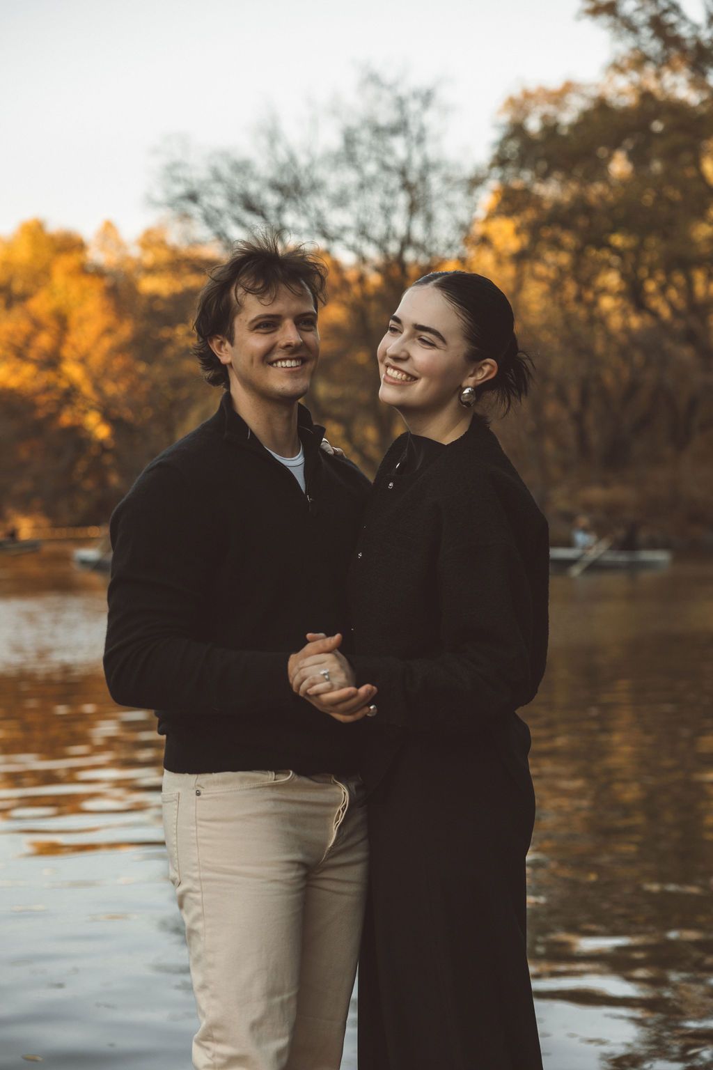 couple laughing with each other during their session