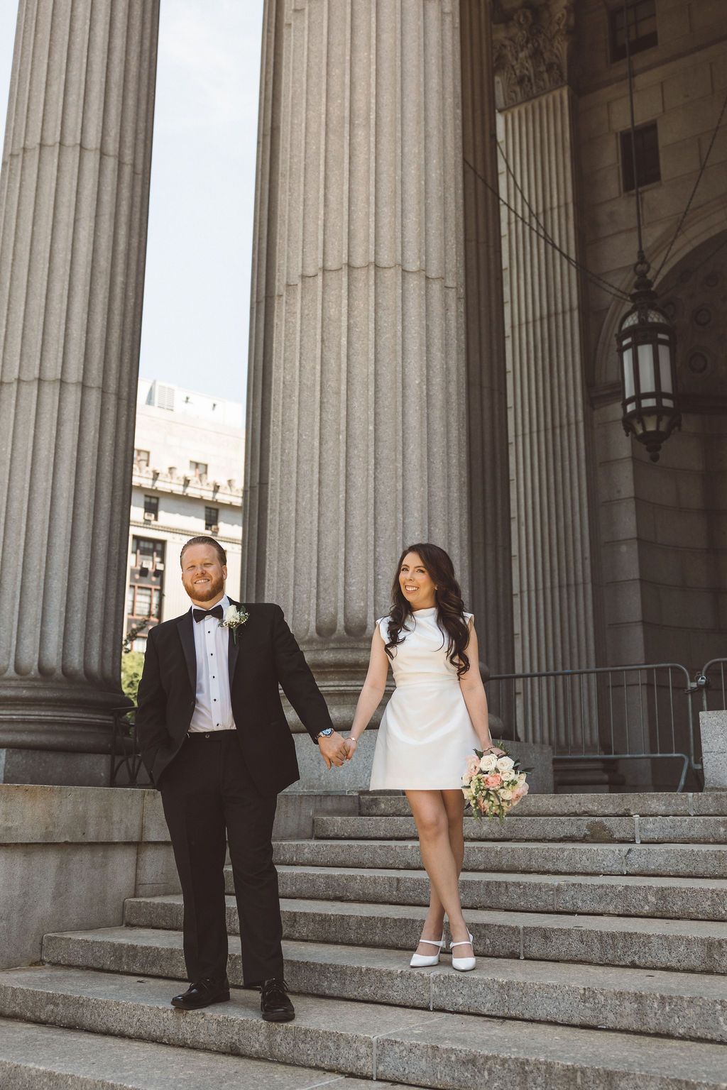 cute picture of the newlyweds holding hands