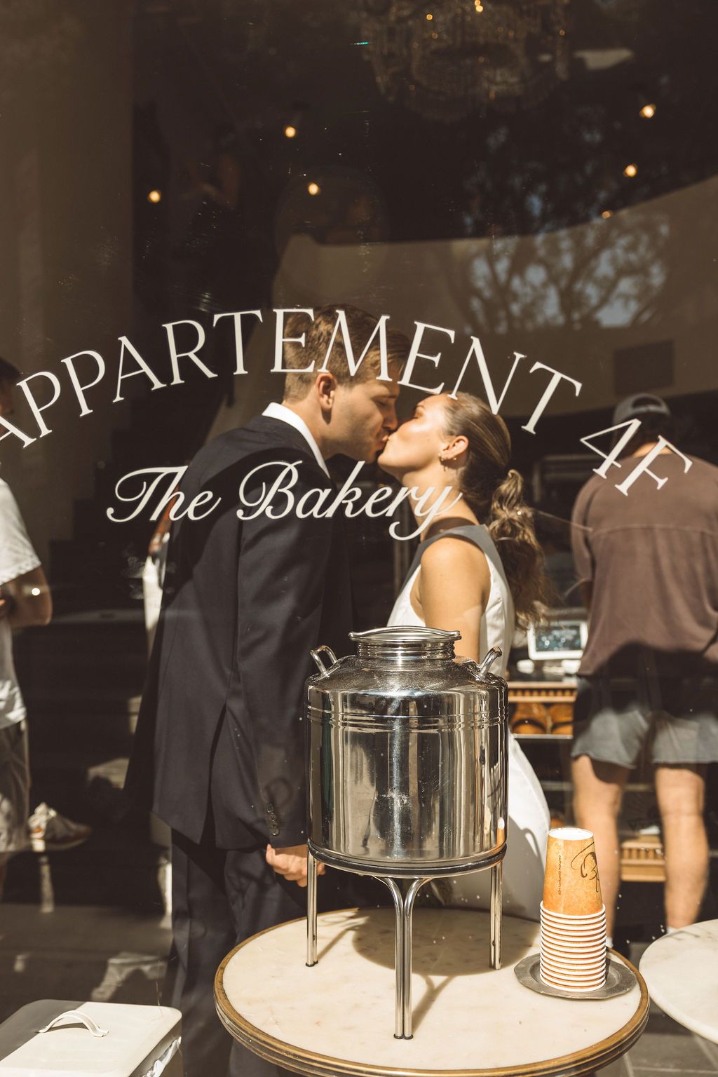 cute picture of the bride and groom kissing