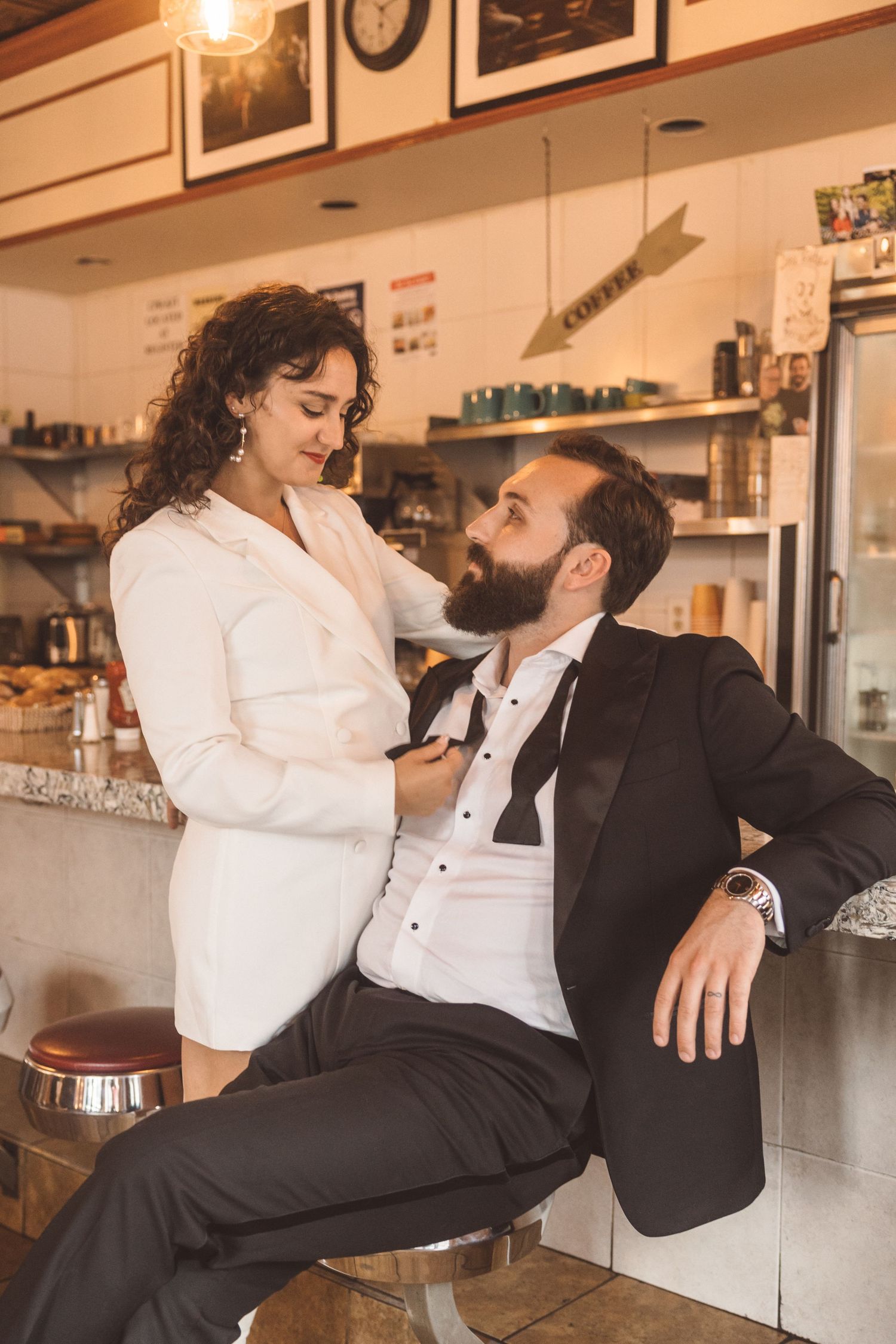 Portrait of the newly engaged couple smiling at each other