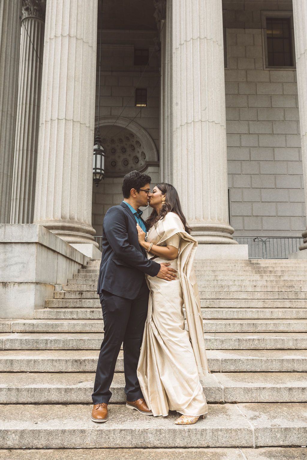 cute picture of the bride and groom kissing
