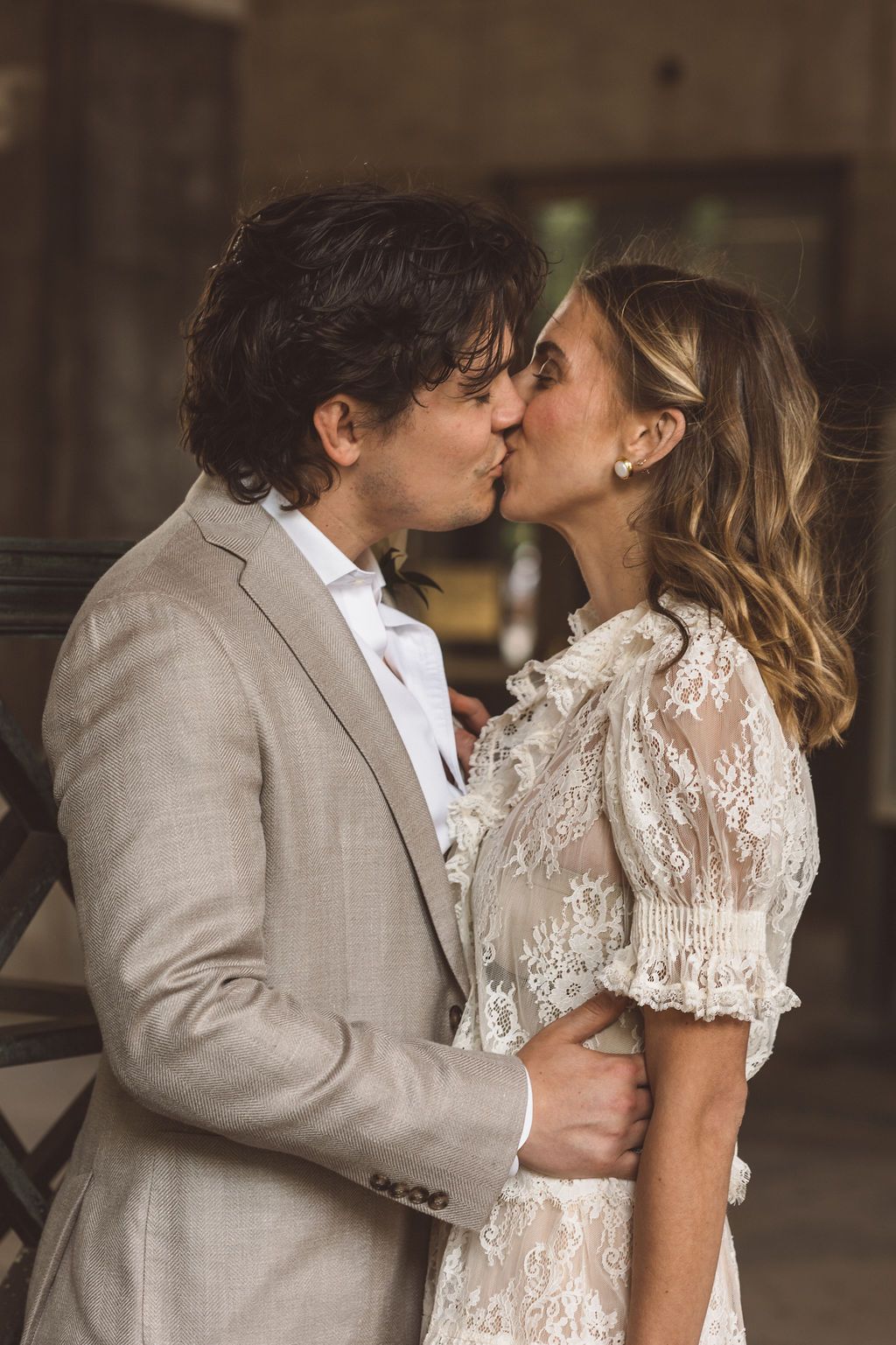 portrait of the newlyweds kissing after their elopement ceremony in NYC