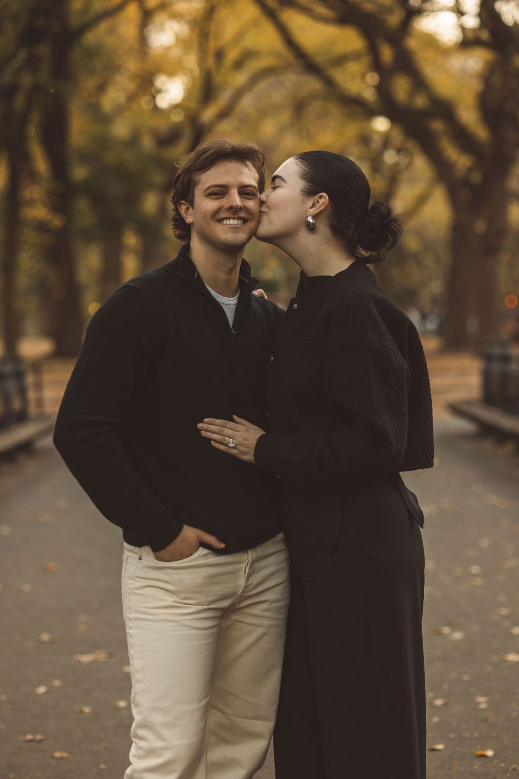 fiance kissing her fiance on the cheek