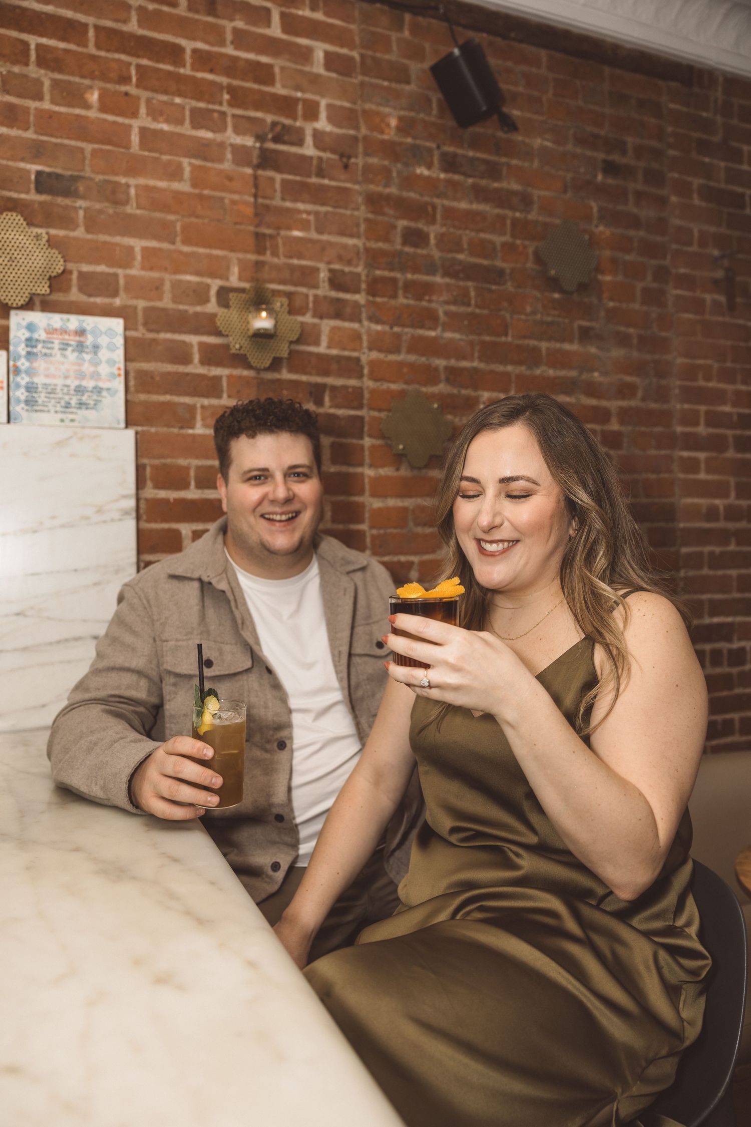 couple at their favorite bar during their engagement session