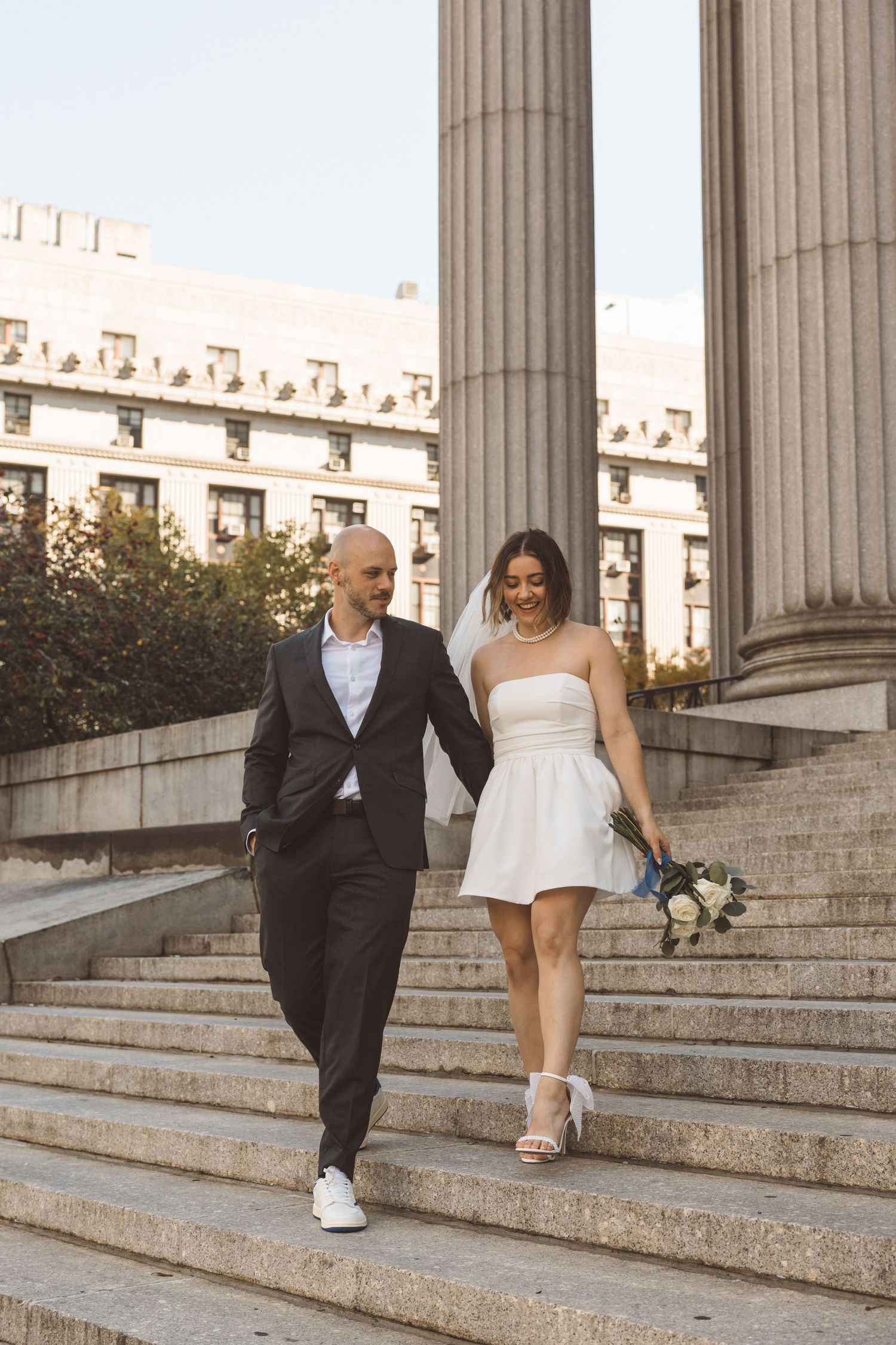 Couple walking around New York during their bridal photos
