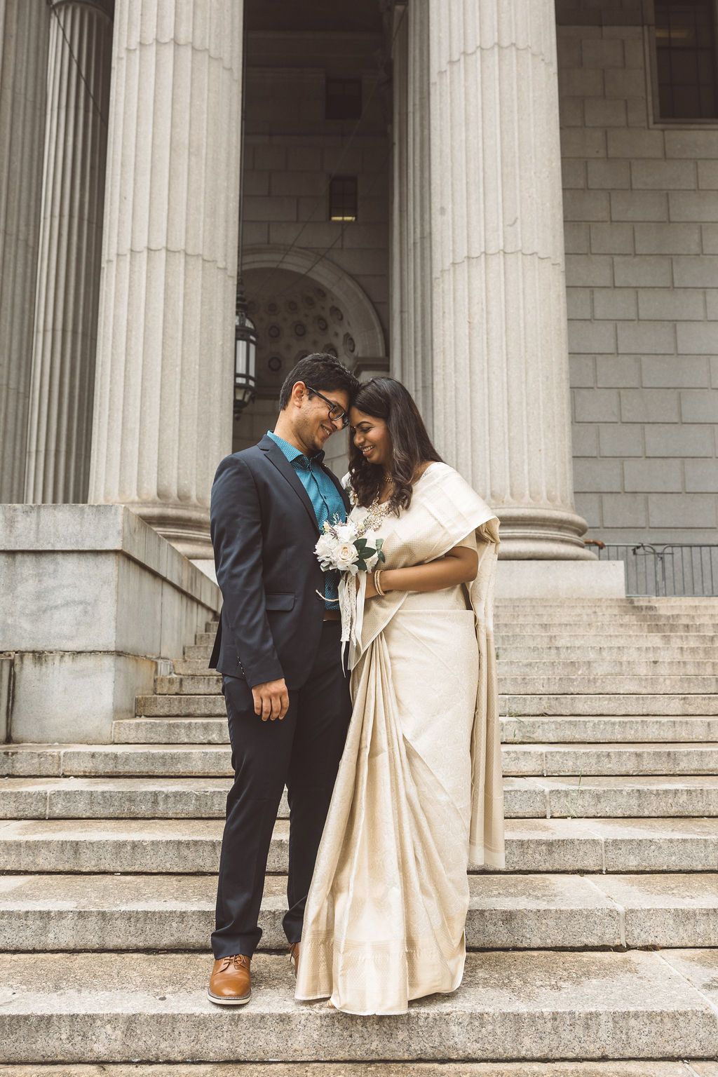 cute couple at their NYC bridal portraits