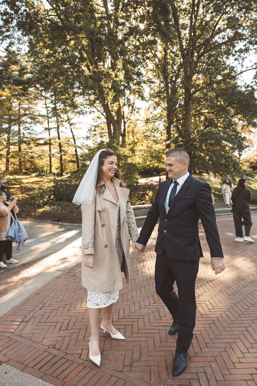 couple walking around NYC during their bridal photoshoot