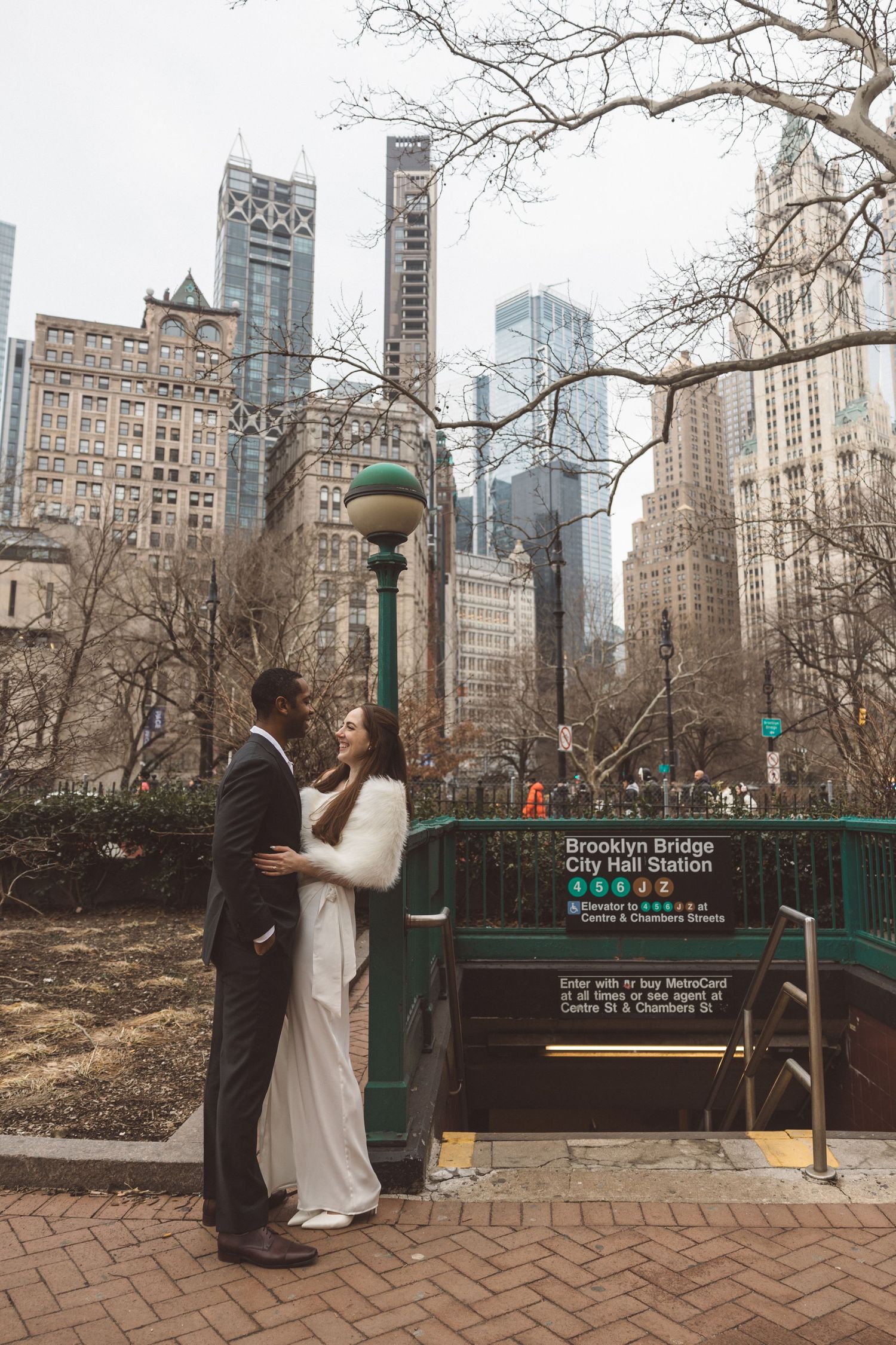 Portrait of the bride and groom, smiling at each other