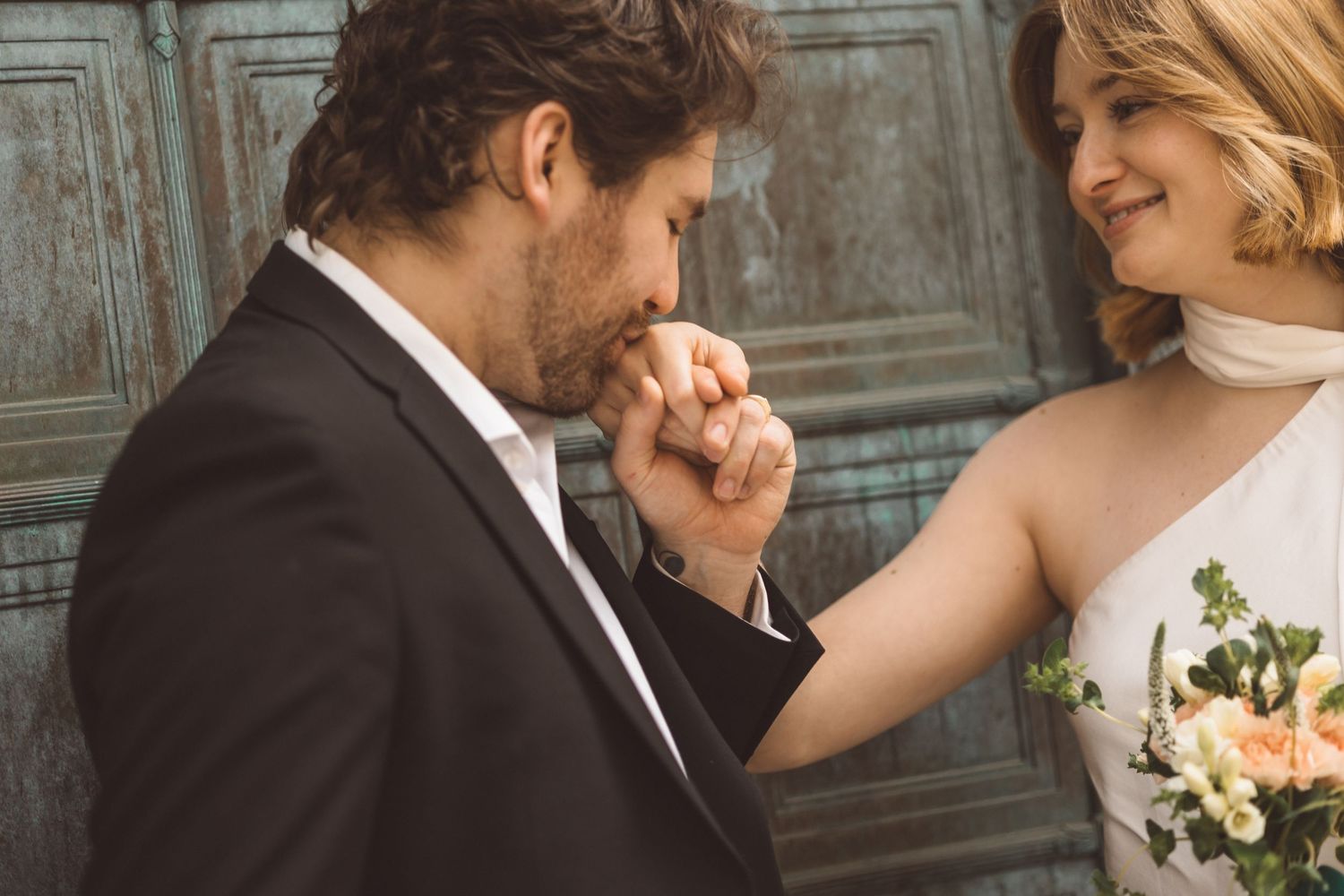 Romantic moment of couple leaving City Hall after their civil ceremony in New York City