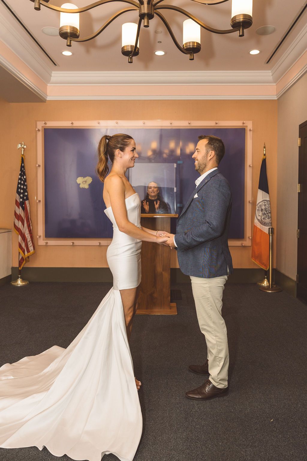 bride and groom holding hands during their ceremony