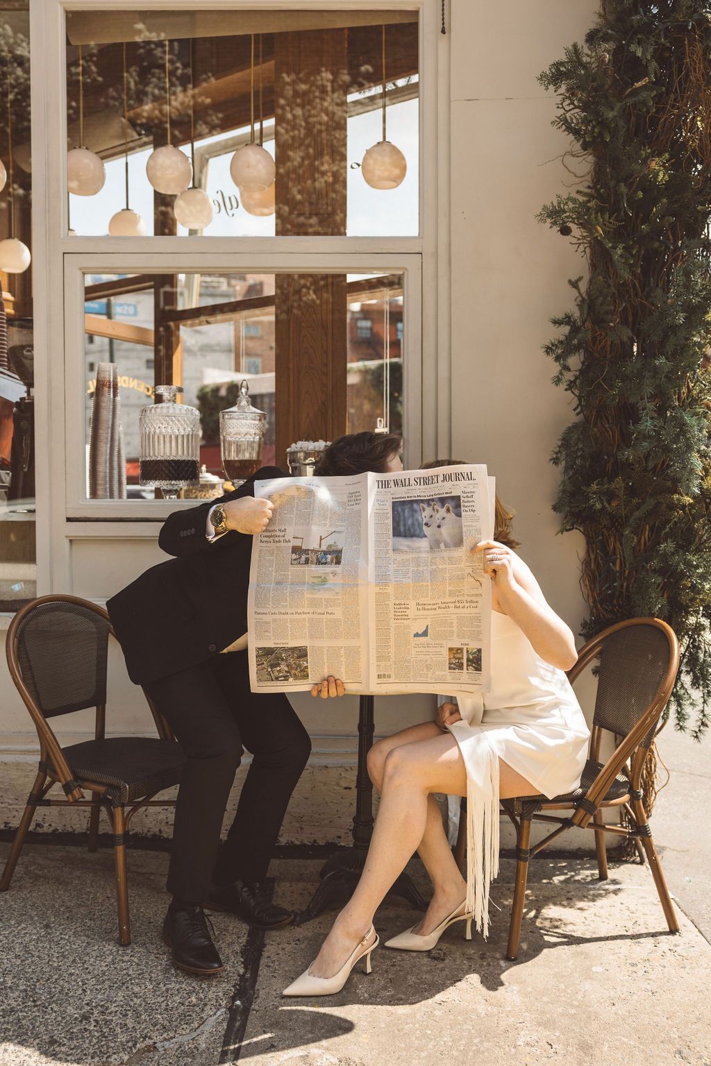 bride and groom kissing during their photoshoot