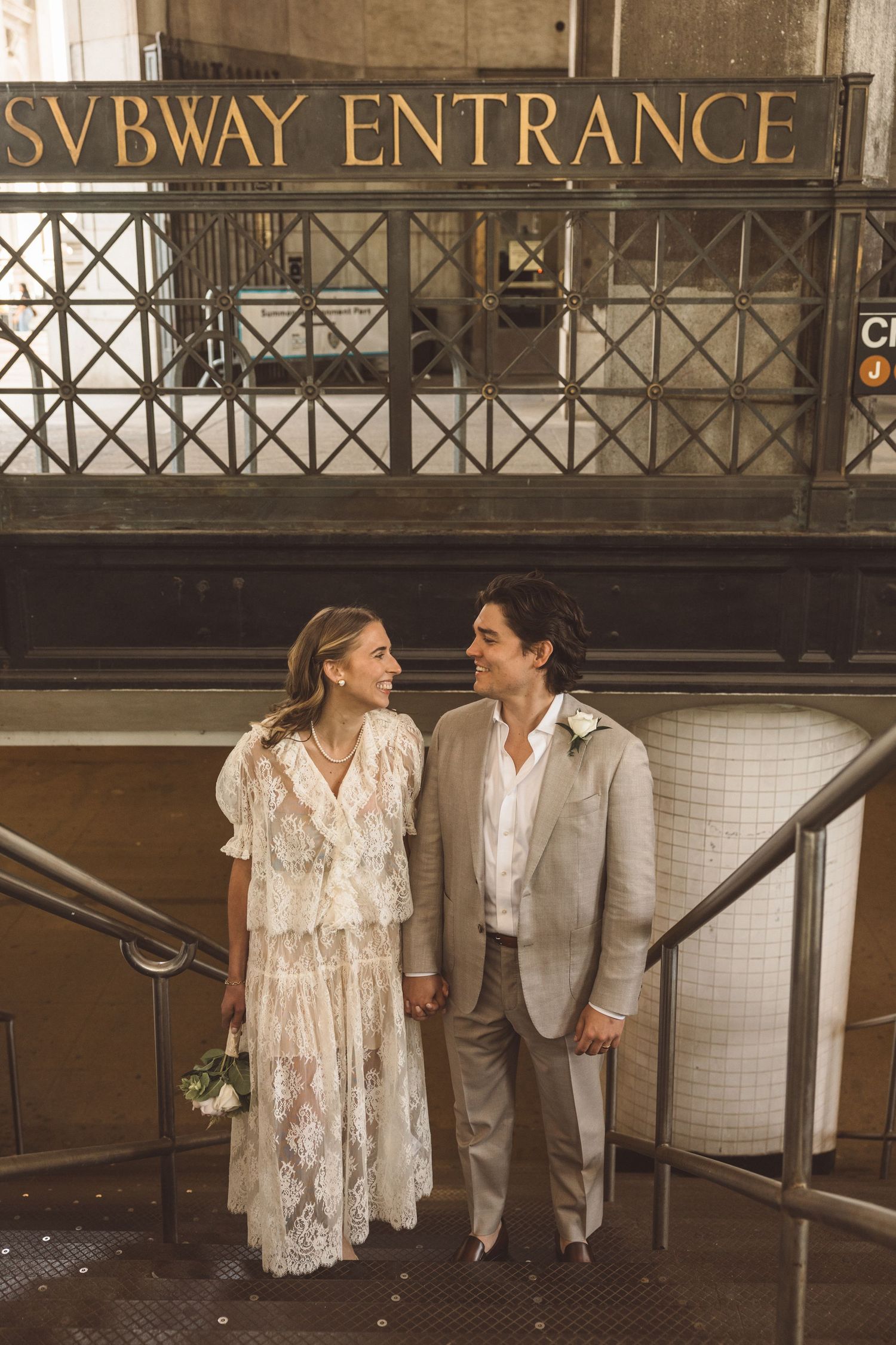 bride and groom exploring NYC during their bridal portraits