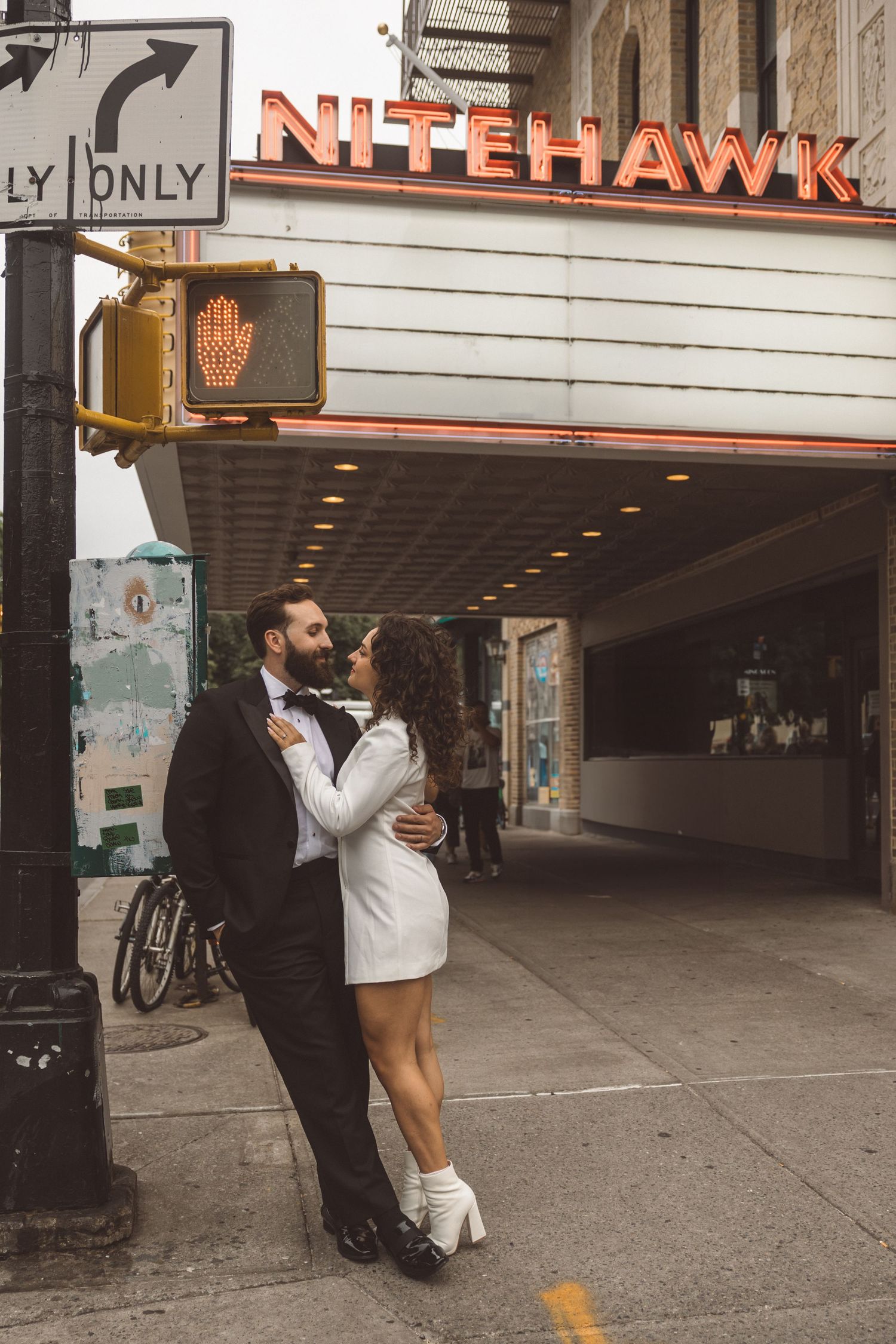 cute picture of the newly engaged couple kissing