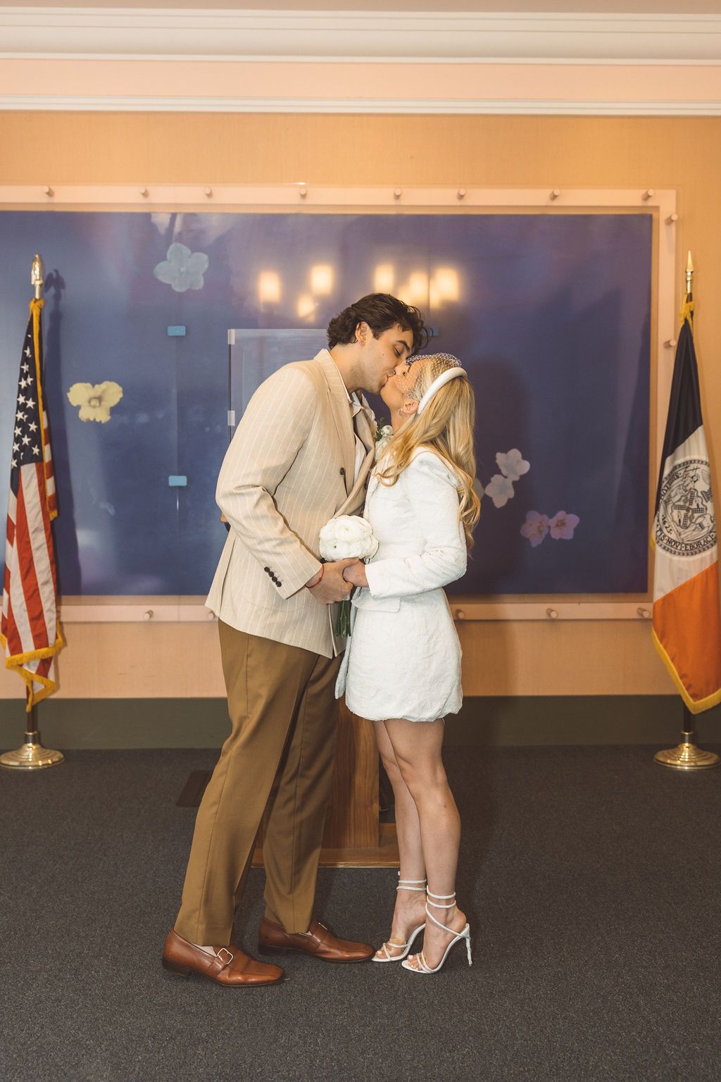 portrait of the newlyweds kissing