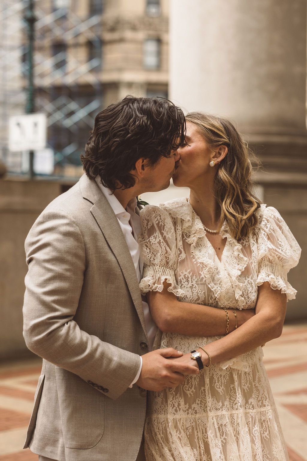 cute picture of the newlyweds kissing