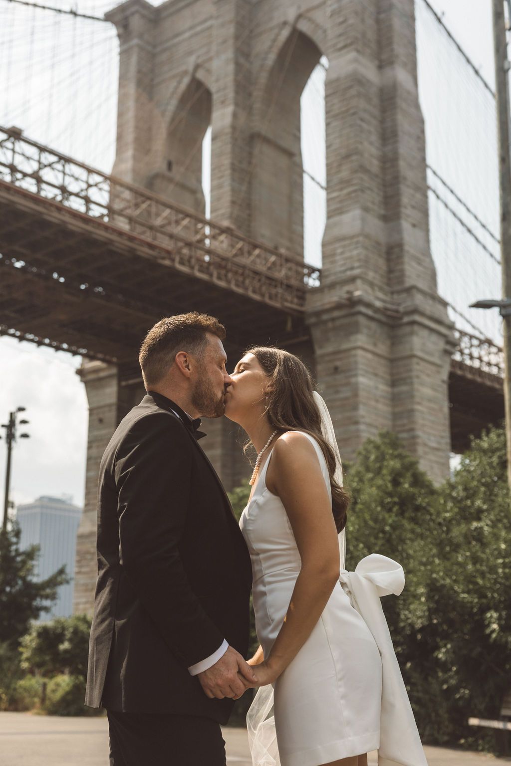 cute picture of the newlyweds kissing