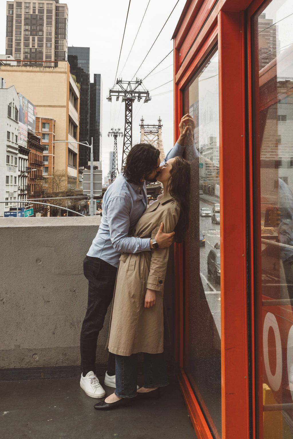 cute portrait of the newly engaged couple kissing