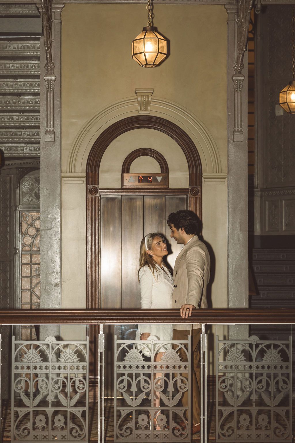 cute picture of the newlyweds smiling at each other