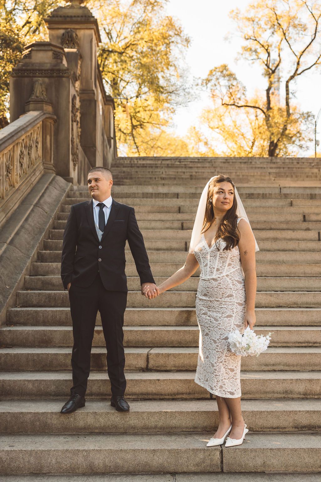 couple holding hands during their bridal portraits