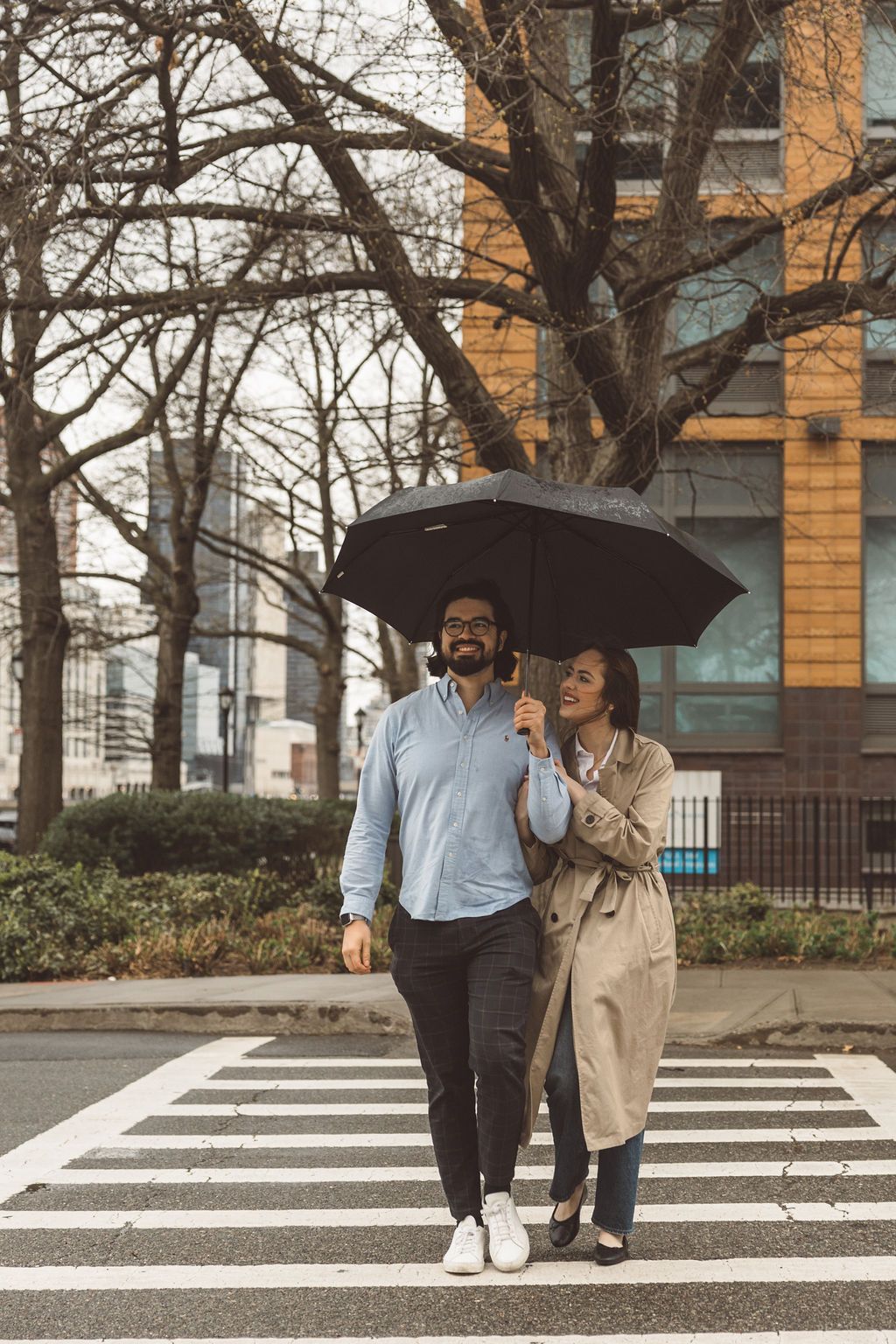 couple laughing with each other during their session
