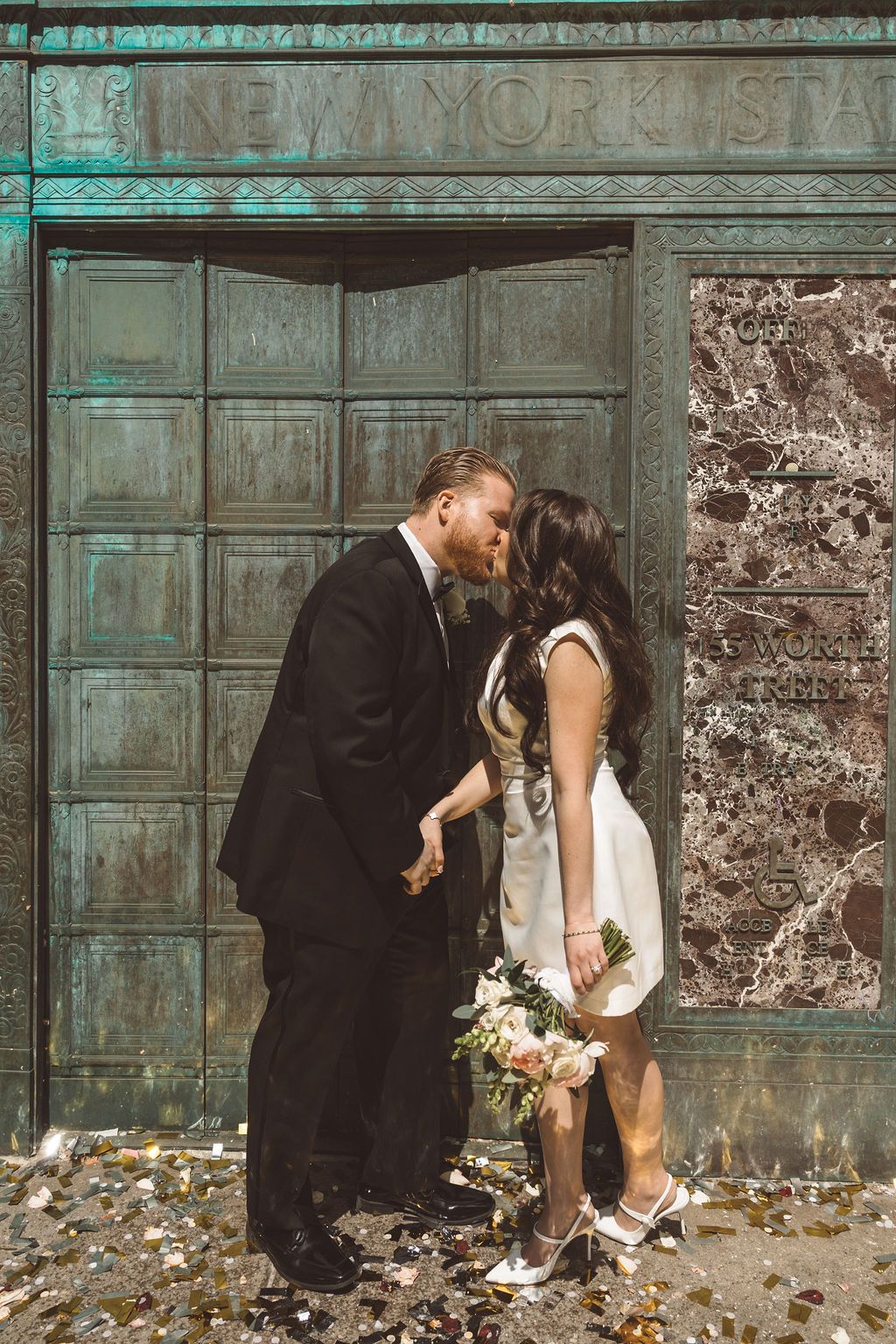 cute picture of the newlyweds kissing