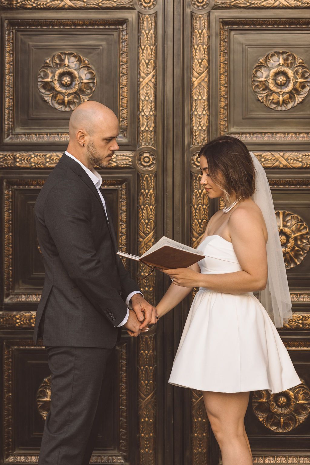 bride and groom emotional during their private vows