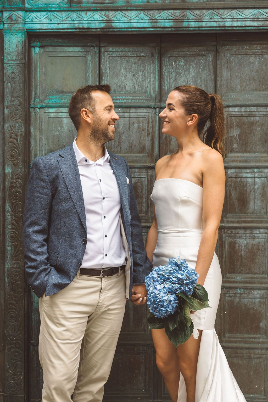 portrait of the newly married couple smiling at each other