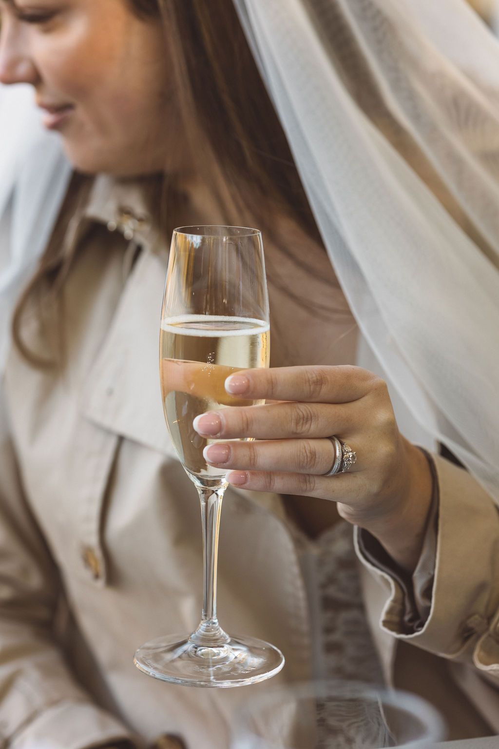 bride celebrating their elopement with champagne