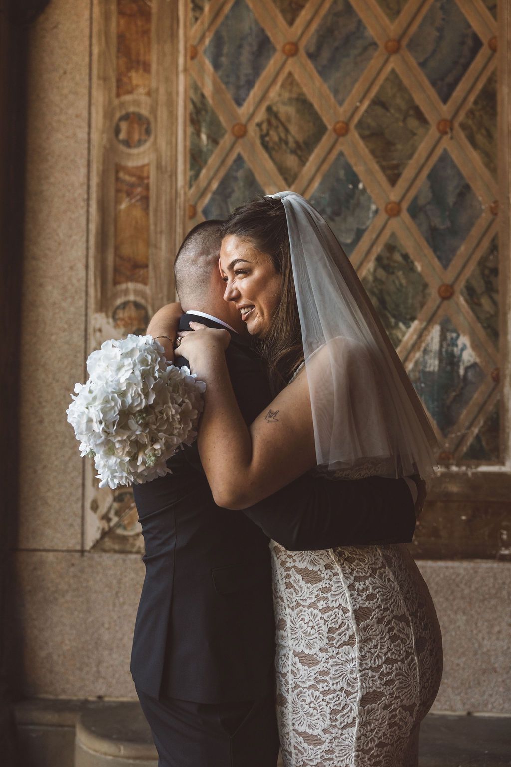 newlyweds hugging after their elopement ceremony