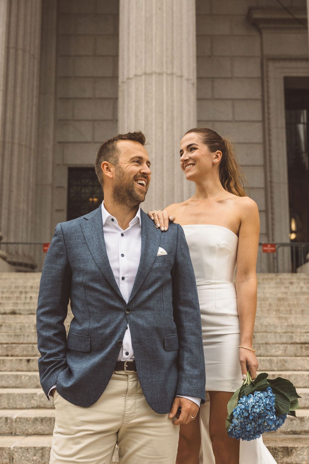 Cute picture of the bride and groom, smiling at each other