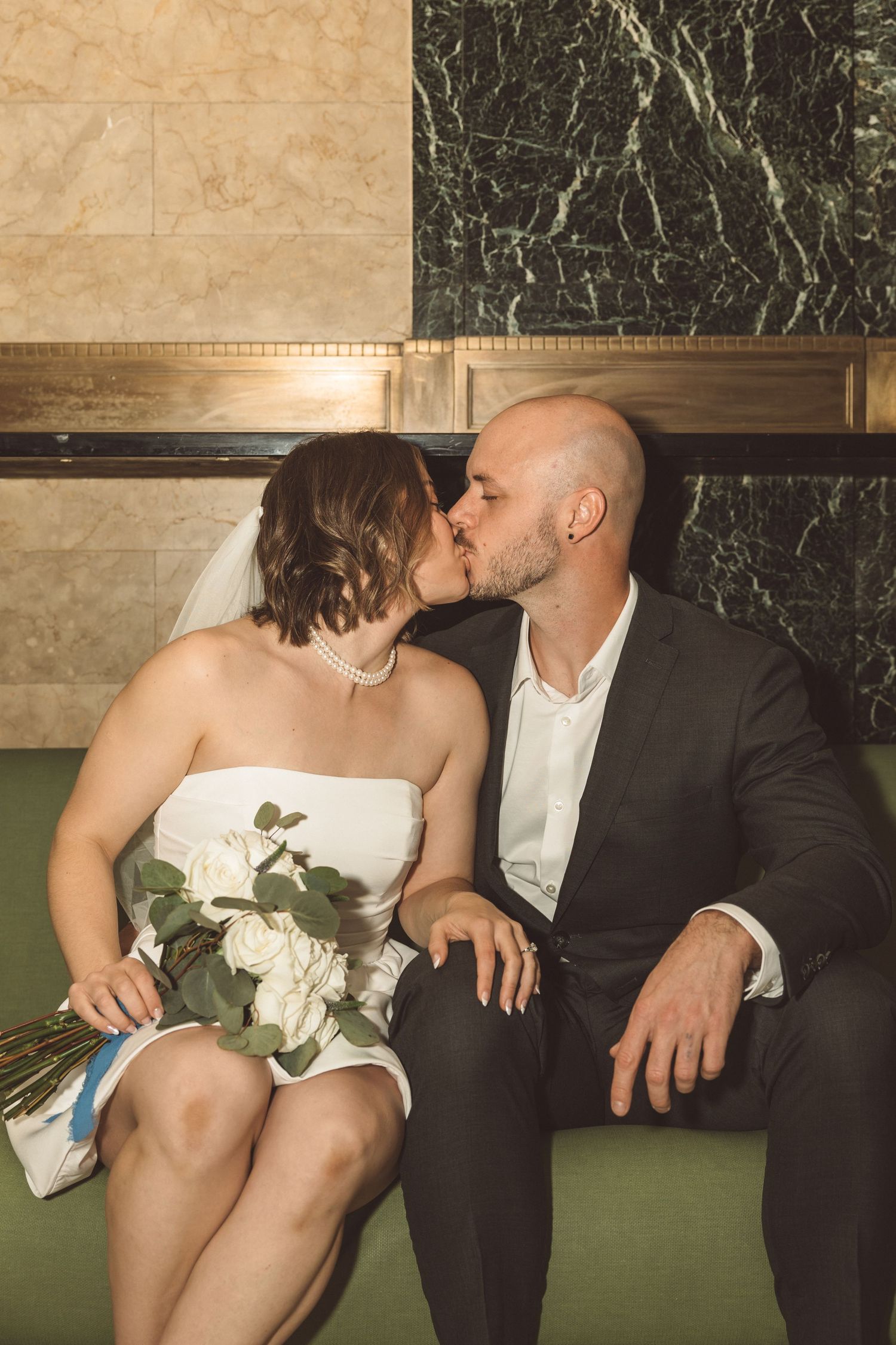 Picture of the bride and groom, kissing