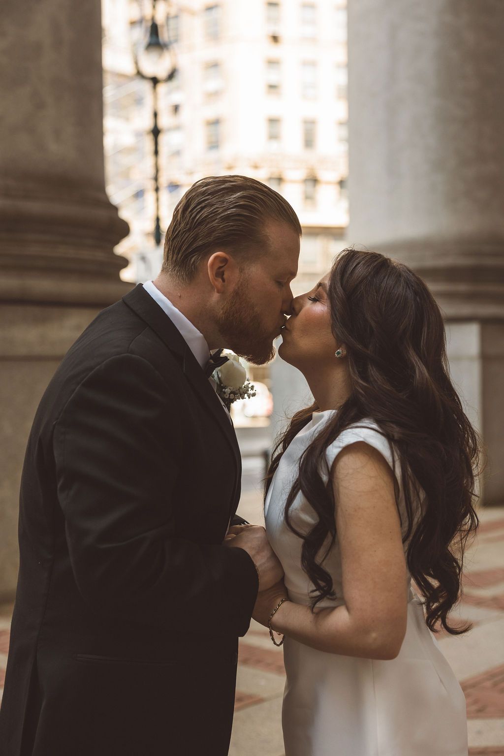 picture of the newlyweds kissing during their bridal session