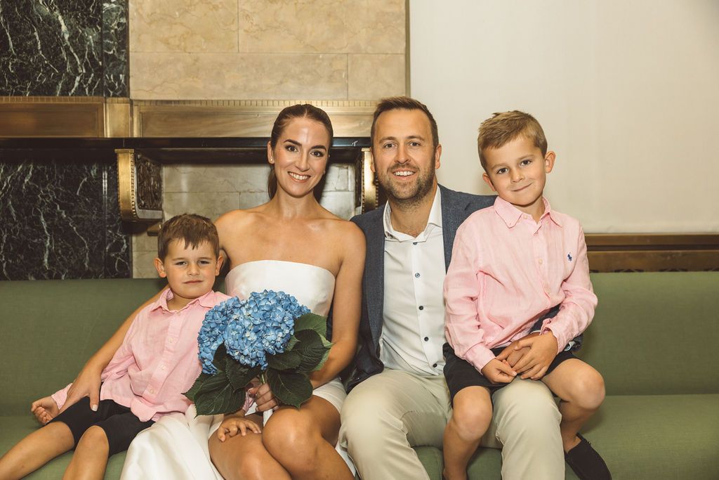 cute picture of the bride and groom with their kids