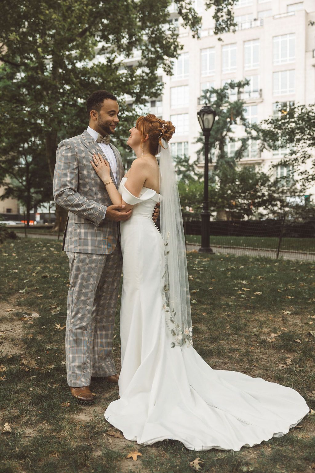 couple smiling at each other during their bridal portraits