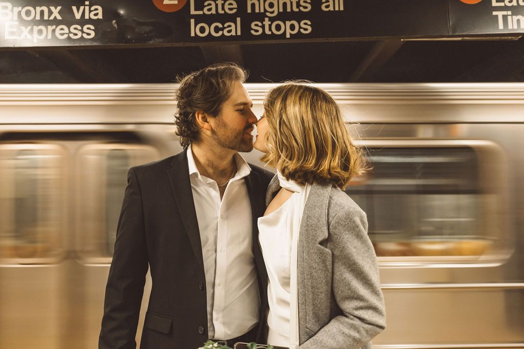 portrait of the newly married couple kissing