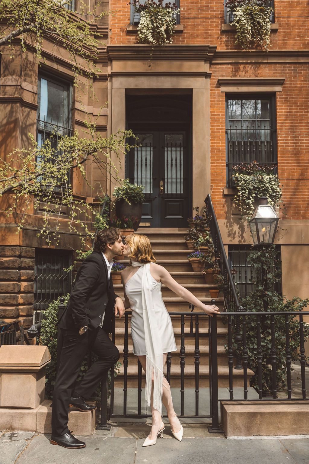 cute portrait of the newlyweds kissing