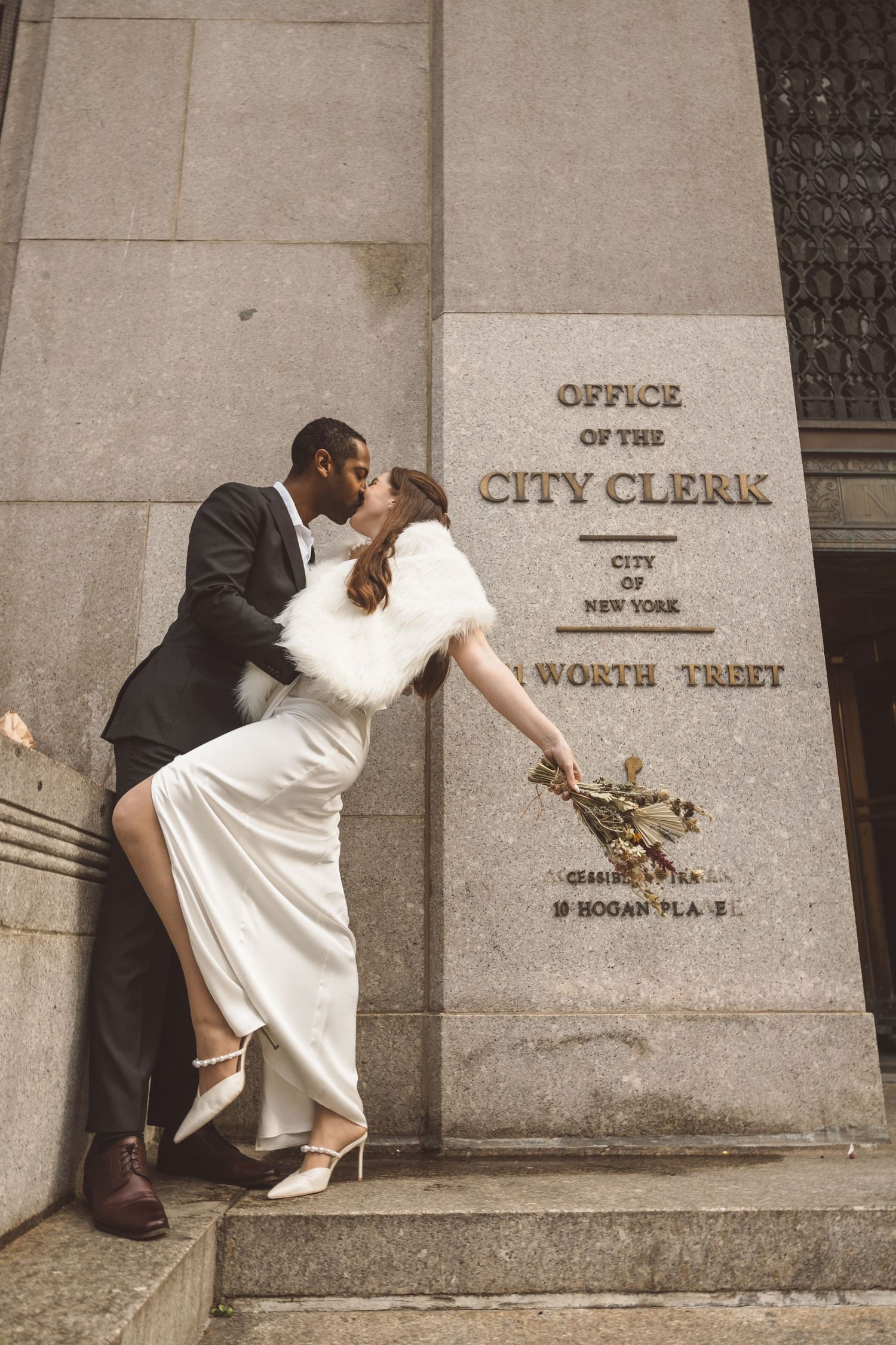 Picture of the newly married couple kissing