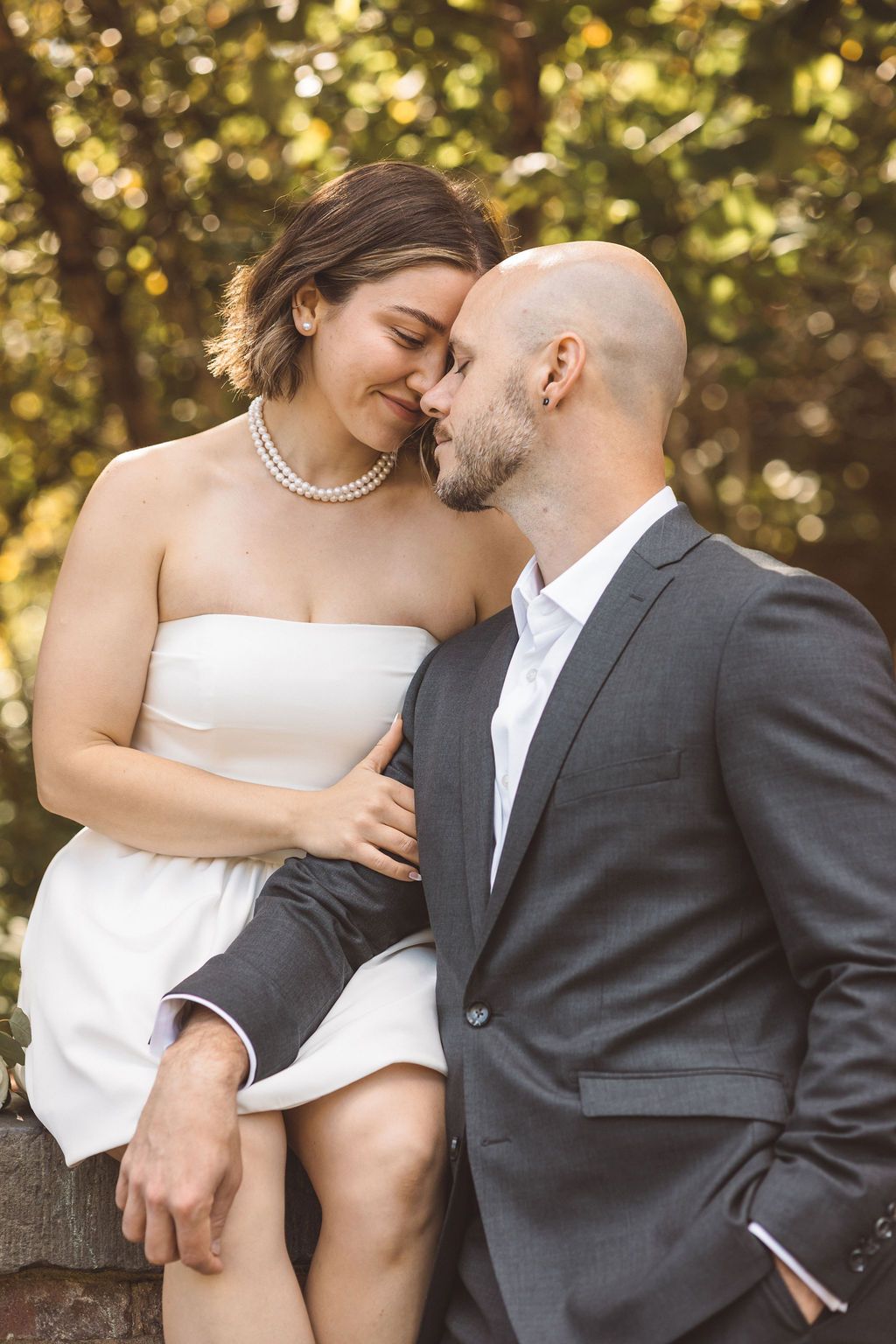 bride kissing the groom on the cheek