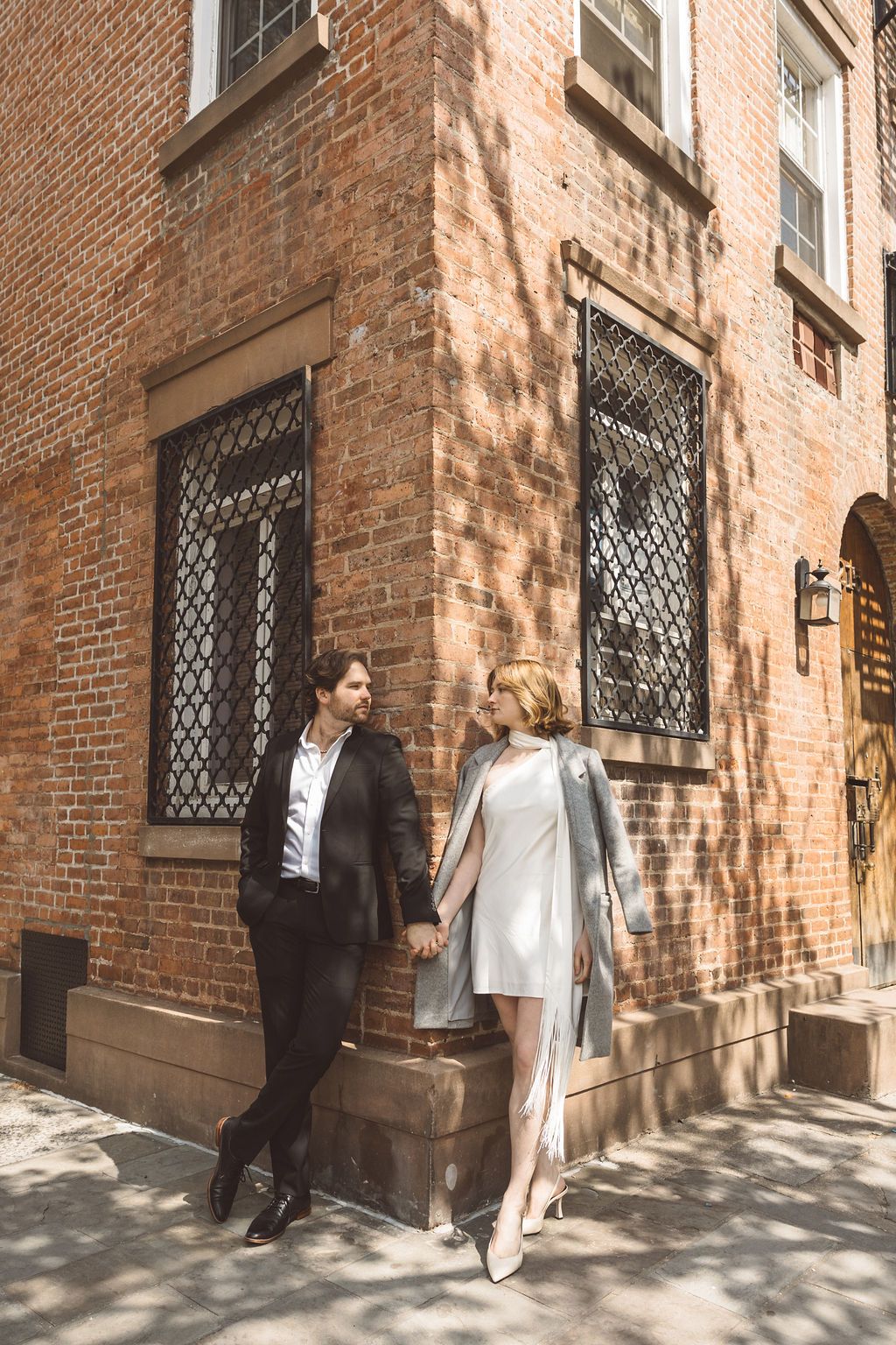cute picture of the newlyweds smiling at each other