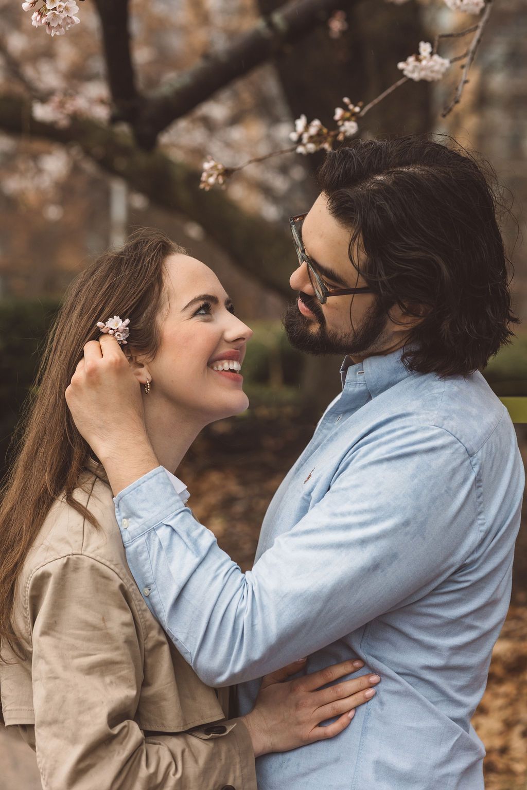 cute picture of the newly engaged couple smiling at each other