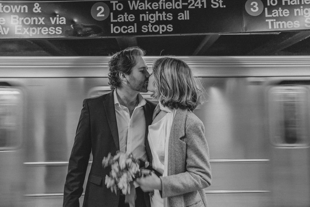 cute picture of the newlyweds kissing