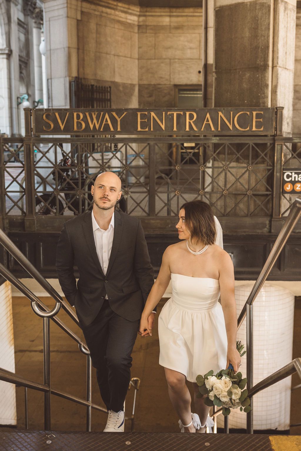 cute picture of the newlyweds holding hands